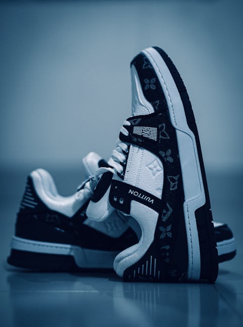 High-end fashion sneakers in a studio setting, emphasizing luxury and style.